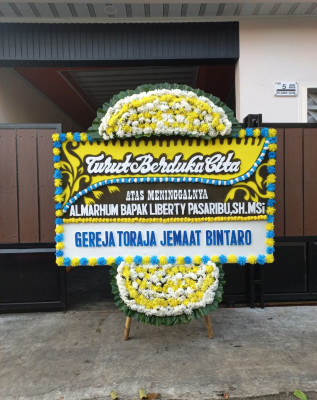 Papan Bunga Duka di Bulakan